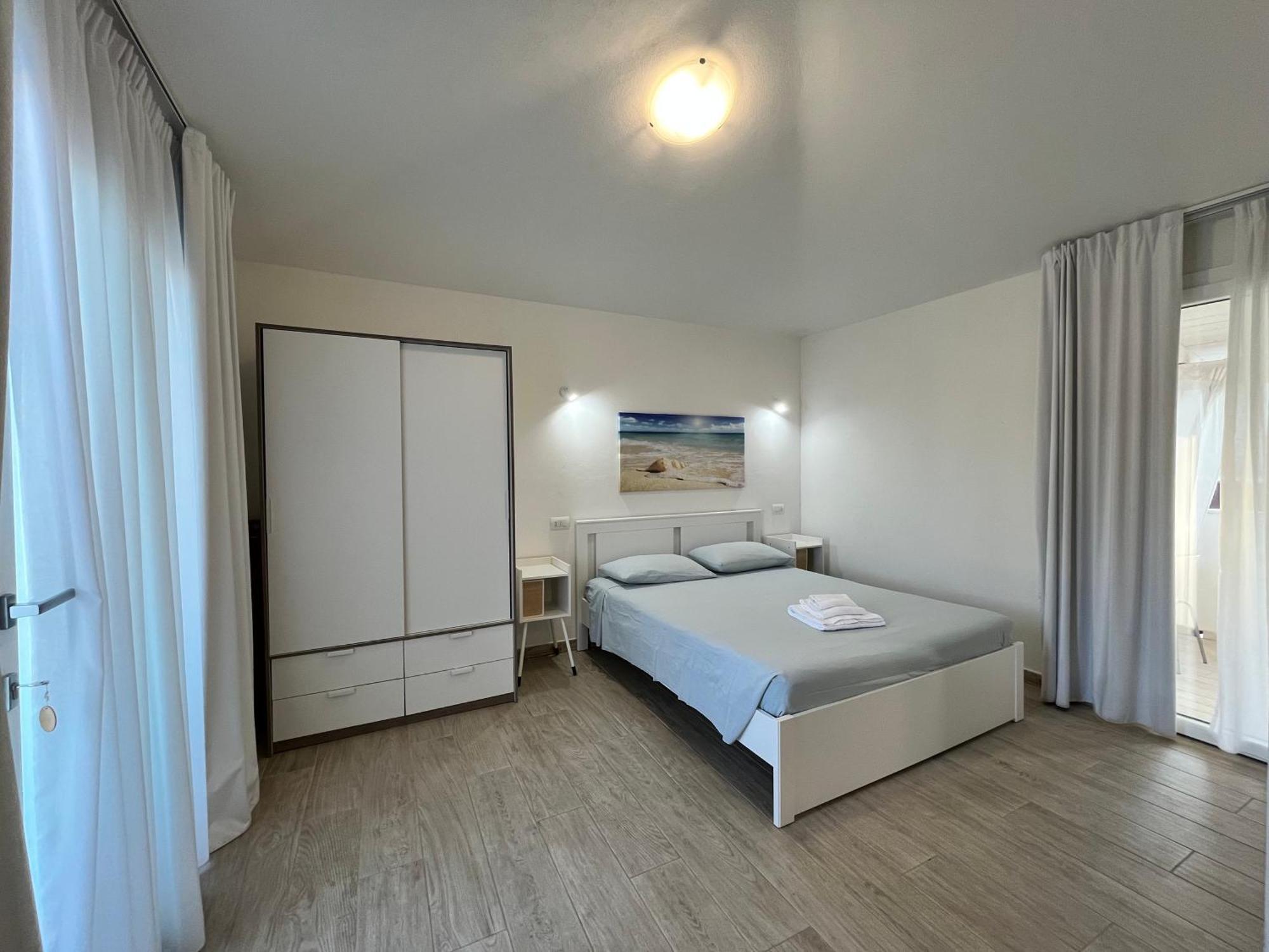 Case Vacanze "Bianco Mare" Порто Пино Екстериор снимка